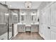Elegant bathroom with a double vanity, granite countertops, and a large glass shower at 725 S State St, Raleigh, NC 27601