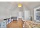 Spacious bedroom with hardwood floors, a bed, and dressers at 725 S State St, Raleigh, NC 27601