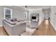 Cozy living room featuring hardwood floors, comfortable seating, and bright windows, creating a welcoming atmosphere at 725 S State St, Raleigh, NC 27601