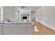 Bright living room featuring hardwood floors and a decorative entertainment center at 725 S State St, Raleigh, NC 27601