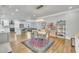 Open-concept living space blending the kitchen, dining room, and living area, creating a unified and inviting atmosphere at 725 S State St, Raleigh, NC 27601