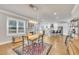 Spacious layout connecting the kitchen and dining area, featuring a beverage area and seamless flow for entertaining at 725 S State St, Raleigh, NC 27601
