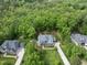 Lovely aerial view of the home showcasing curb appeal, landscaping and driveway at 7517 Summer Pines Way, Wake Forest, NC 27587