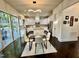 Modern kitchen with stainless steel appliances, granite countertops, and stylish lighting, perfect for cooking at 7517 Summer Pines Way, Wake Forest, NC 27587