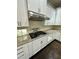 Granite countertops accent this modern kitchen complete with updated appliances and subway tile backsplash at 7517 Summer Pines Way, Wake Forest, NC 27587