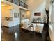 Spacious living room with fireplace, kitchen access, and high ceilings at 7517 Summer Pines Way, Wake Forest, NC 27587