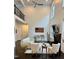 Bright living room with high ceilings, fireplace, and lots of natural light at 7517 Summer Pines Way, Wake Forest, NC 27587