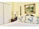 Serene bedroom featuring a four-poster bed, painting, and natural light, great for relaxing at 775 Sid Eaves Rd, Youngsville, NC 27596