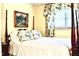 Cozy bedroom with a floral-patterned pillows and a painting, offering a peaceful retreat at 775 Sid Eaves Rd, Youngsville, NC 27596