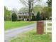Traditional two-story home with a long driveway and mature landscaping, perfect for a serene setting at 775 Sid Eaves Rd, Youngsville, NC 27596