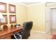 Bright office space with a large desk, comfortable chair, and natural light, perfect for work at 775 Sid Eaves Rd, Youngsville, NC 27596