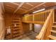 Garage with storage loft, shelves, and a door leading to the home's interior at 8124 Greywinds Dr, Raleigh, NC 27615