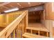 Garage space features a wooden staircase and a storage loft area at 8124 Greywinds Dr, Raleigh, NC 27615