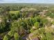A neighborhood is nestled amidst lush greenery and mature trees, offering a serene and picturesque living environment at 84 Honeysuckle Dr, Pittsboro, NC 27312