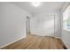 Light and airy bedroom features new flooring, neutral paint, and bright, natural light at 84 Honeysuckle Dr, Pittsboro, NC 27312