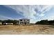New two story home exterior elevation under construction showing wrapped facade and construction progress at 91 Gobbler Dr, Smithfield, NC 27577