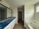 New bathroom boasting double vanity, soaking tub, and modern fixtures at 10 Silver Ct, Smithfield, NC 27577