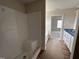 Bathroom featuring a new shower stall and a dual sink vanity with granite counters at 10 Silver Ct, Smithfield, NC 27577