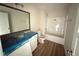 Bathroom featuring a single vanity, toilet, and tub/shower combo with stylish fixtures at 10 Silver Ct, Smithfield, NC 27577
