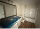 Well-lit bathroom features a tub-shower combination, a vanity sink, and modern fixtures at 10 Silver Ct, Smithfield, NC 27577