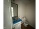 Compact bathroom features a vanity with granite countertop and a toilet at 10 Silver Ct, Smithfield, NC 27577
