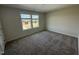 Bedroom features carpet flooring and a double window view at 10 Silver Ct, Smithfield, NC 27577