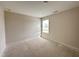 Neutral bedroom with large window for natural light and ample space at 10 Silver Ct, Smithfield, NC 27577