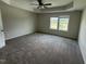 Bedroom has carpet and a window overlooking a lawn at 10 Silver Ct, Smithfield, NC 27577