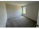 Cozy bedroom with neutral carpet, a bright window, and ample space for a comfortable setup at 10 Silver Ct, Smithfield, NC 27577