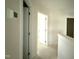 Upstairs hallway with doors leading to bedrooms and bathrooms at 10 Silver Ct, Smithfield, NC 27577