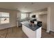 Bright kitchen showcasing white cabinets, stainless steel appliances, and a center island at 10 Silver Ct, Smithfield, NC 27577