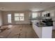 Open kitchen with stainless steel appliances, island, and convenient access to outdoor space at 10 Silver Ct, Smithfield, NC 27577