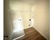 Functional laundry room with flooring, hook-ups and storage solutions at 10 Silver Ct, Smithfield, NC 27577