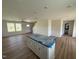 Open floor plan with a view of the stairs and an island with the sink at 10 Silver Ct, Smithfield, NC 27577