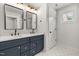 Stylish bathroom with double vanity, quartz countertop, and hexagon tile flooring at 1005 Forrestal Pl, Durham, NC 27707