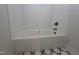 Bright and modern bathroom features white subway tile and decorative black and white floor tiles at 1005 Forrestal Pl, Durham, NC 27707