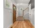Welcoming entryway with hardwood floors, staircase, and a wooden front door at 1005 Forrestal Pl, Durham, NC 27707