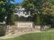 Stonebrook Cottages community sign with trees and landscaping at 101 Hay Sedge Ct, Durham, NC 27705
