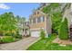 Charming two-story home with a classic design, two-car garage, and a well-manicured lawn at 101 Hay Sedge Ct, Durham, NC 27705