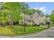 Beautiful two-story home on a corner lot, showcasing lush landscaping and a welcoming front porch at 101 Hay Sedge Ct, Durham, NC 27705