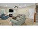 Cozy living room featuring a fireplace and ample seating for entertaining at 101 Hay Sedge Ct, Durham, NC 27705