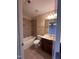 Bathroom with shower/tub combination, single sink and vanity at 102 Revere Forest Ct, Cary, NC 27519