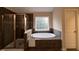 Bathroom with a corner shower, a soaking tub under a window, and decorative tile in shower and tub area at 102 Revere Forest Ct, Cary, NC 27519
