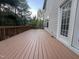 Expansive deck with railing offers outdoor enjoyment and complements the home's exterior at 102 Revere Forest Ct, Cary, NC 27519