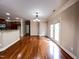Open floor plan with kitchen view, hardwood floors and great natural light at 102 Revere Forest Ct, Cary, NC 27519