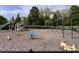 Community playground featuring swings, slides, and other fun activities for enjoyment at 102 Revere Forest Ct, Cary, NC 27519
