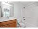 Cozy bathroom with a shower and bath combination, a sink and toilet at 103 Ballyliffen Ln, Cary, NC 27519