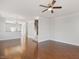 Spacious living room with an open floor plan and stylish hardwood floors at 103 Ballyliffen Ln, Cary, NC 27519