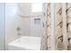 Bathroom showcases a tiled tub and shower combination, complete with a neutral shower curtain at 103 Patriot Way, Apex, NC 27523