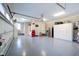 Well-organized garage with storage cabinets and a convenient workstation area at 103 Patriot Way, Apex, NC 27523